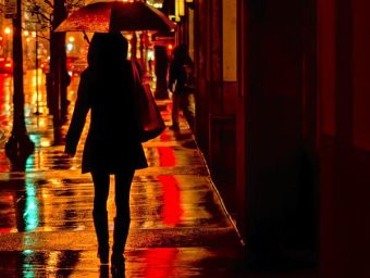 rain-city-night-woman-with-umbrella